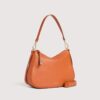 Coccinelle Nory Small